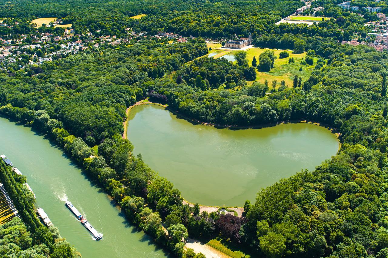 Hotel Dg Mery-sur-Oise Bagian luar foto