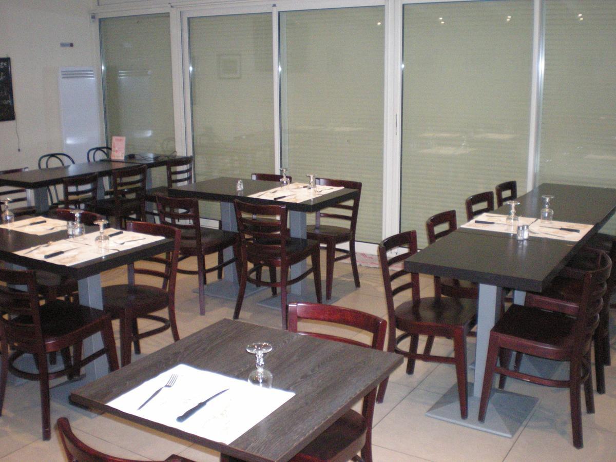 Hotel Dg Mery-sur-Oise Bagian luar foto