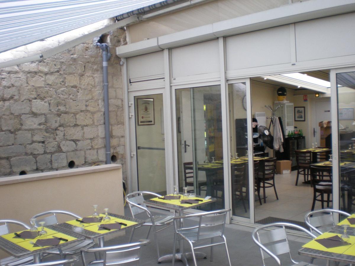 Hotel Dg Mery-sur-Oise Bagian luar foto